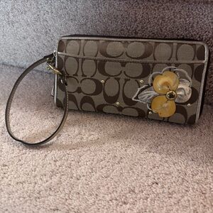 Coach Wristlet with Yellow Floral Detail